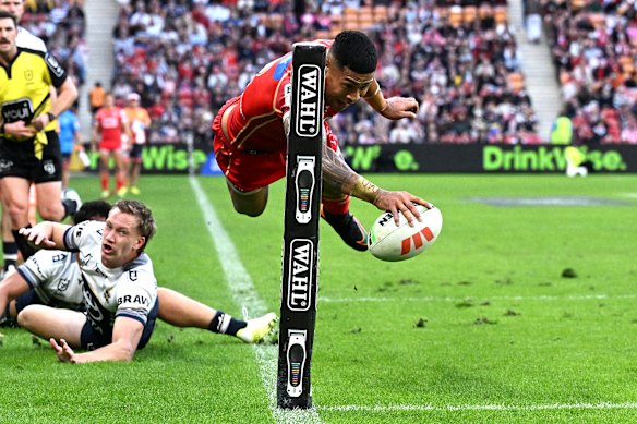 Eyes on the tries: Jamayne Isaako of the Dolphins scores in the corner.