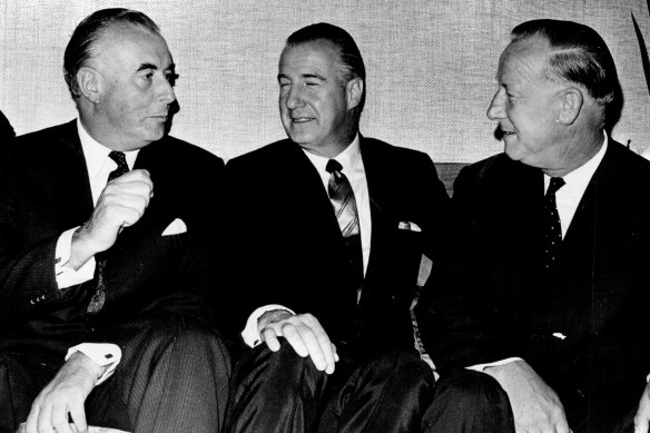 The Leader of the Federal Opposition, Mr. E. G. Whitlam (left), and the Deputy Leader, Mr. L. H. Barnard, (right) talk with the U.S. Vice-President, Mr. Spiro Agnew, at the Canberra Rex Hotel yesterday. January 16, 1970.