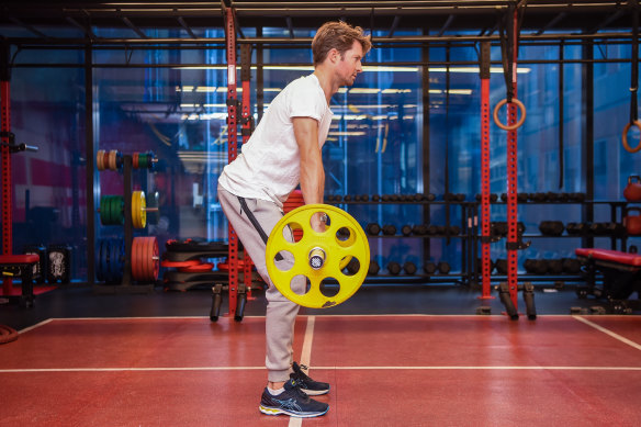 Physiotherapist Luke Pickett performing a deadlift.