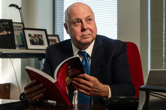 Treasurer Tim Pallas with a copy of Tuesday’s budget.