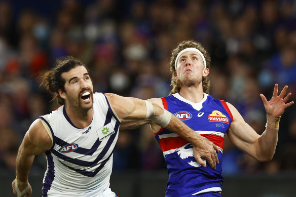 Battle of the big men: Aaron Naughton and Alex Pearce are likely to be direct opponents at Optus Stadium on Saturday night.