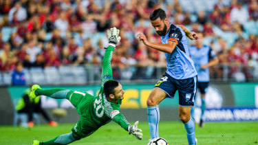 Derby dominance: Brosque scores against Western Sydney Wanderers last season.