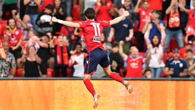 Double delight: Craig Goodwin celebrates after scoring one of his two terrific goals in the FFA Cup final.