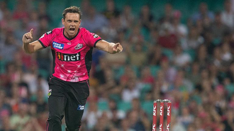 Buoyant: Steve O'Keefe of the Sixers celebrates the wicket of Max Bryant.