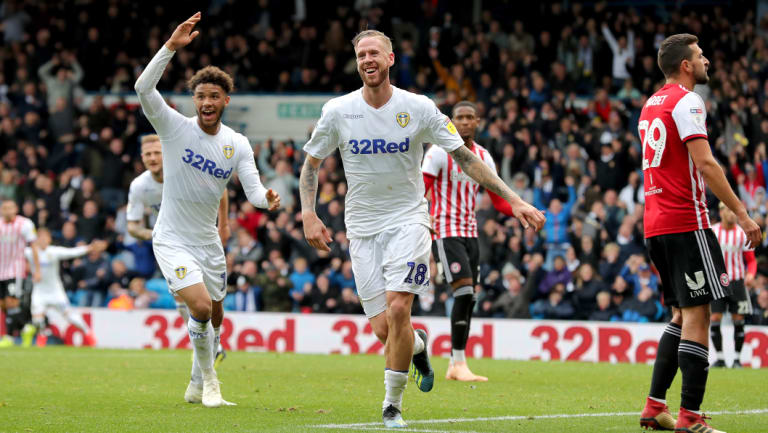 Shared spoils: Leeds needed Pontus Jansson's (centre) late goal to earn a point.
