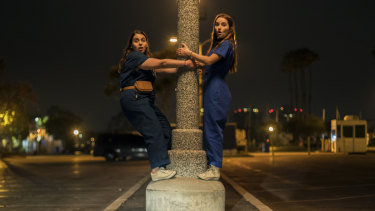 Girls gone wild: Molly (Beanie Feldstein) and Amy (Kaitlyn Dever) try pole dancing.