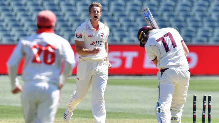 Joe Mennie celebrates Matthew Renshaw's dismissal.