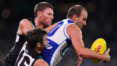 Ben Cunnington tries to fight his way through, but is facing match review scrutiny.