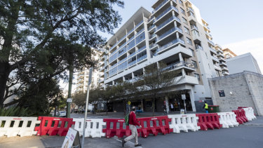 Residents were told to evacuate the building after cracks were discovered in the downstairs car park. 