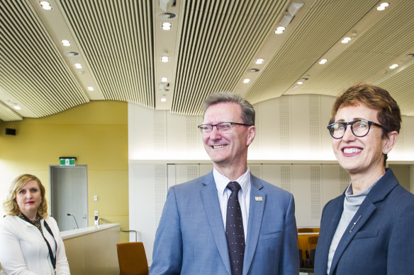 Chief Justice, Helen Murrell shows Attorney-General, Gordon Ramsay around the new court room's advanced technology earlier this month. Pictured with in court technology officer, Drani Sarkozi.