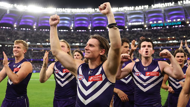 Flight of the Dockers: Extra Qantas services deployed as purple army sets sights on Sydney