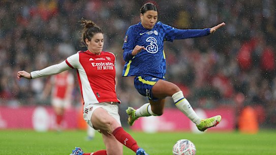 Jennifer Beattie battles for possession with Sam Kerr during the FA Cup final at Wembley Stadium.