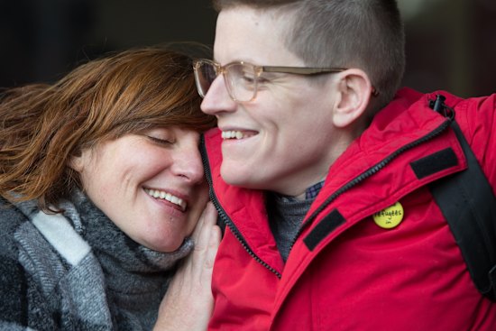 Roz Ward ws embraced by a supporter on her return to La Trobe University in 2016.