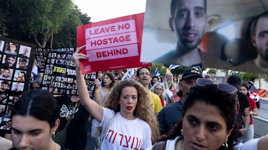 Demonstrators in Tel Aviv, Israel, hold photos of hostages held in the Gaza Strip during a protest on on the 600th day since the October 7 attack on Wednesday. It is believed Hamas still holds more than 50 hostages.