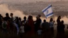 Right-wing Israeli activists rally in a call to resettle the northern Gaza Strip.