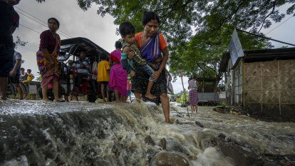 Millions of homes under water as floods hit India, Bangladesh