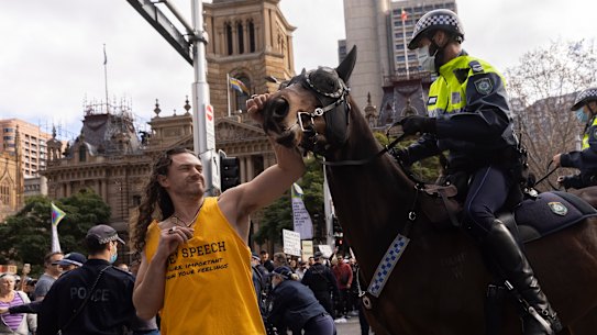 Kristian Pulkownik, pictured, has been charged with affray, joining or continuing in an unlawful assembly, committing an act of cruelty upon an animal and not complying with a noticed direction in relation to COVID-19.