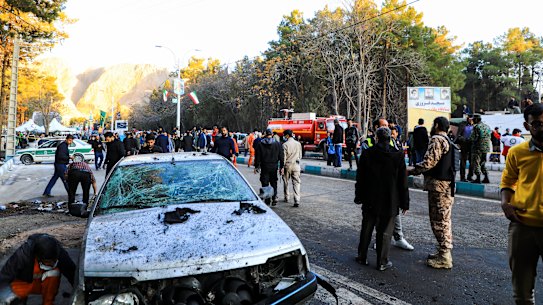 People gather at the site of an explosion in the city of Kerman, about 820 kilometres southeast of the capital Tehran, Iran.