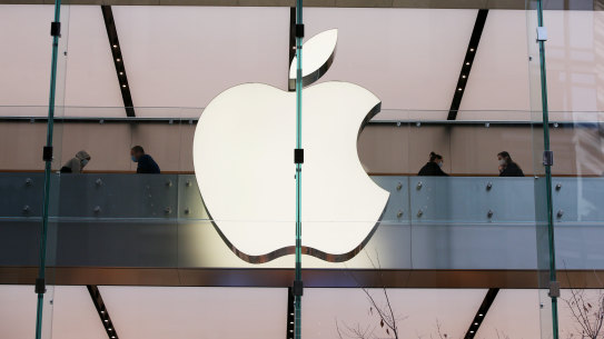 Apple's more than 3 per cent gain at midday helped lift Wall Street to record highs.