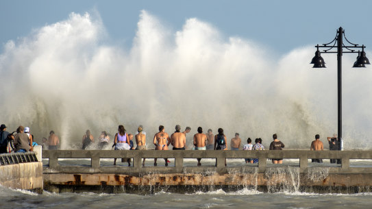 Hurricane Laura whipped up waves in Florida as the storm passed well to the west of the state.