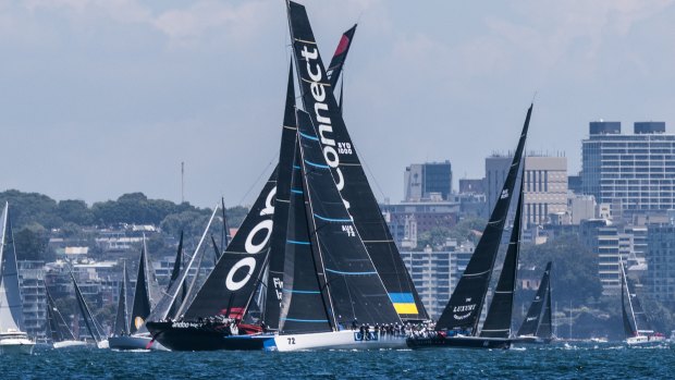 Andoo Comanche leads Sydney to Hobart fleet after chaotic harbour start