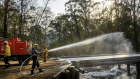 Firefighters are bracing for deteriorating conditions later this week, after using milder conditions to consolidate containment lines. 