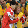 China’s Sun Yang hugs Australian coach Denis Cotterell.