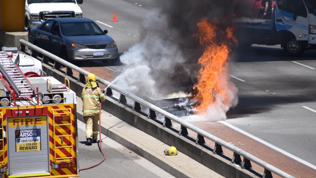 Traffic brought to a standstill as car bursts into flames on Perth freeway