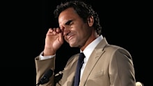 Roger Federer wipes away tears at the Hall of Fame induction. 