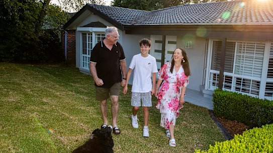 Sellers Peter and Cristina Cameron, with son Jack, at their home in Glenhaven – where property prices have reached new heights.