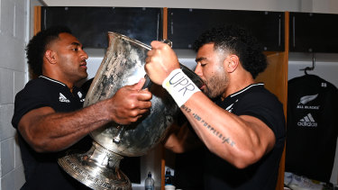 The All Blacks toast their victory in game II at Eden Park, but have pulled out of the third Bledisloe in Perth.