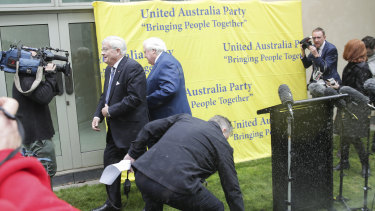 Senator Brian Burston and Clive Palmer on Monday.
