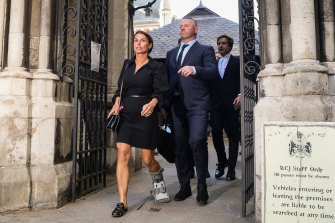 Coleen Rooney and Wayne Rooney leave the Royal Courts of Justice, Strand on May 17, 2022.