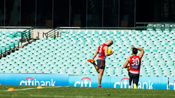 Adam Goodes and Jarrad McVeigh at training back in 2014.