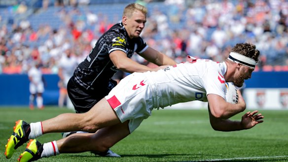 Pioneering spirit: Elliott Whitehead crosses against New Zealand in the second half in Denver.