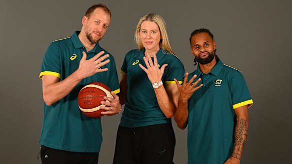 Joe Ingles, Lauren Jackson and Patty Mills pose after each being selected for their fifth Olympics.