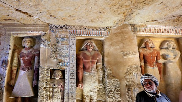 Saeed Abdel Aal, an excavation worker stands at the recently uncovered tomb of the Priest royal Purification during the reign of King Nefer Ir-Ka-Re.