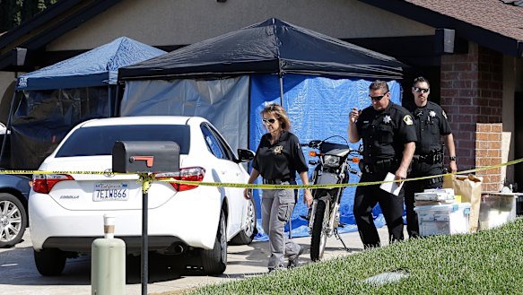 Sacramento County Sheriffs deputies outside the home of Joseph James DeAngelo.