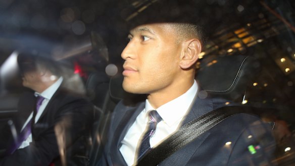 Israel Folau leaves Rugby Australia headquarters, Sydney, following the code of conduct hearing.