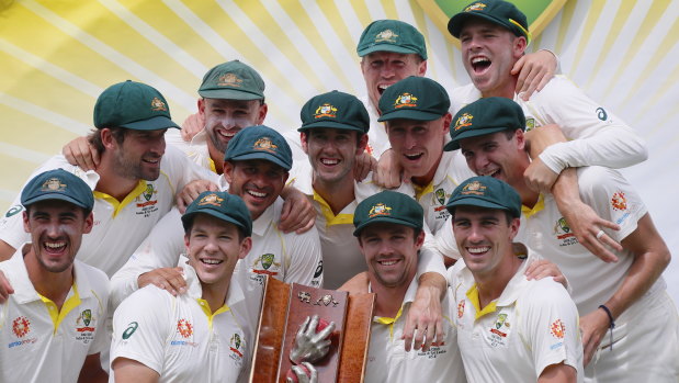 Winning feeling: Tim Paine's Australian team celebrate a 2-0 series victory against Sri Lanka.