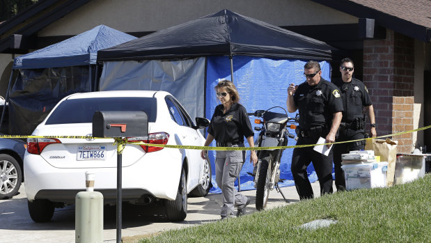 Sacramento County Sheriffs deputies outside the home of Joseph James DeAngelo.