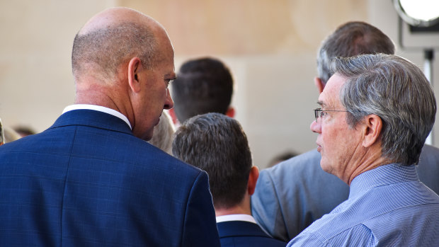 Outgoing Liberal MPs Dean Nalder and Mike Nahan share a word behind their colleagues at a press conference in November where Zak Kirkup was announced as the party's new leader. Mr Nalder had been in the running for the top job before withdrawing.