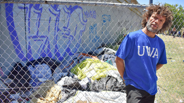 Raymond Ward, 47, has been bagging rubbish at 'tent city' but gets nowhere when he asks for the City of Perth to put in a skip bin near the Lord Street underpass.