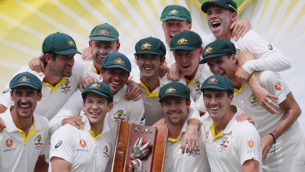 Winning feeling: Tim Paine's Australian team celebrate a 2-0 series victory against Sri Lanka.
