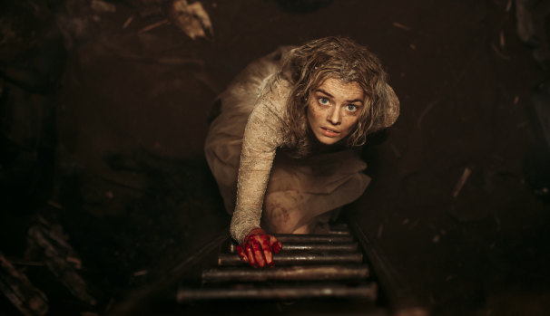 Samara Weaving gets her hands dirty in the horror Ready or Not.