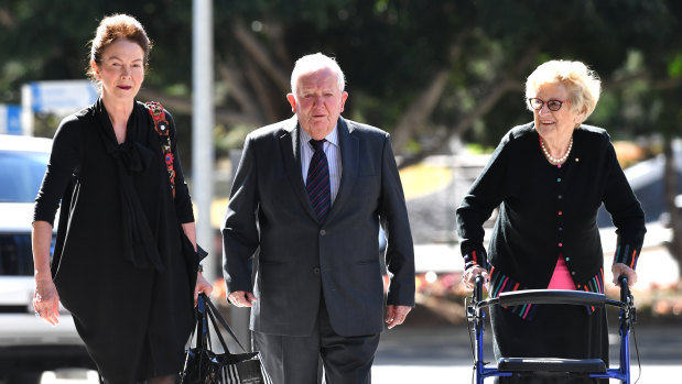 Henry Wagner with his daughter Kate Greer (left) and wife Mary Wagner (right) arrive at court.