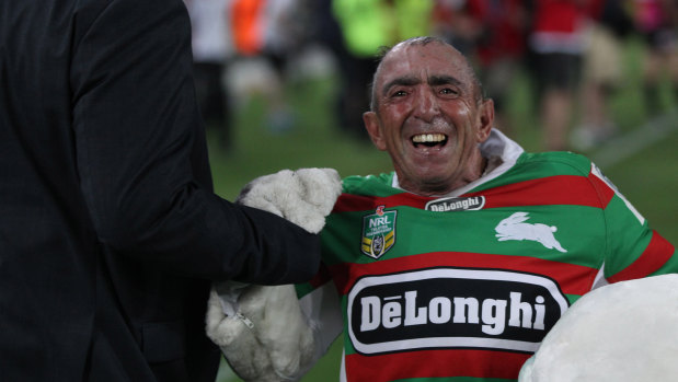 Charlie Gallico celebrates the 2014 grand final victory for South Sydney. He asked ex-Rabbitohs CEO Shane Richardson if he could take the mask off to savour the moment.