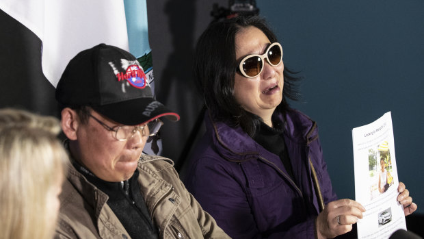 Zhihe Yu and Qing He, parents of missing woman Qi Yu, speak to the media in Sydney on Tuesday. 