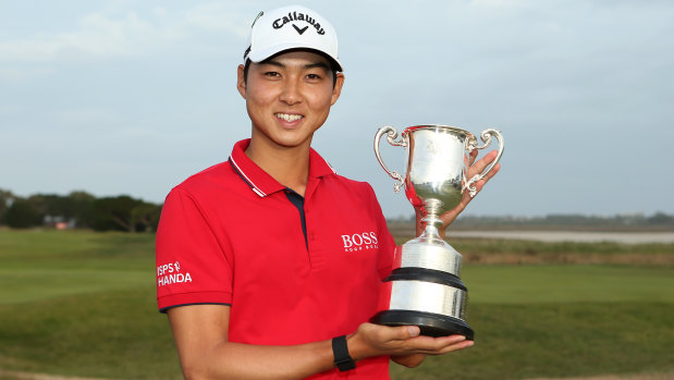 Trophy moment: Min Woo Lee after winning the Vic Open at 13th Beach Golf Club.