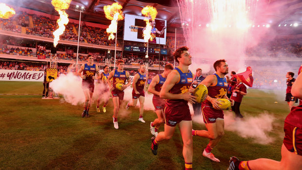 The Lions run out during the AFL semi-final match between the Brisbane Lions and the Greater Western Sydney Giants at The Gabba in 2019.